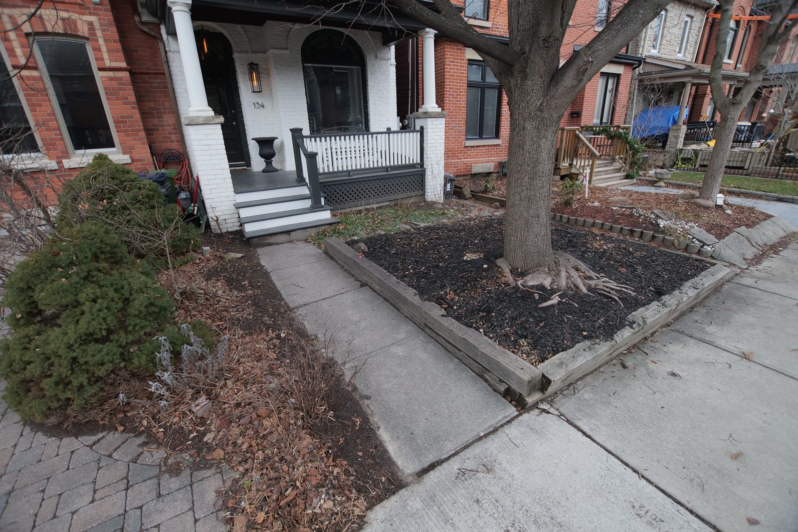 Original concrete walkway and timber garden edging